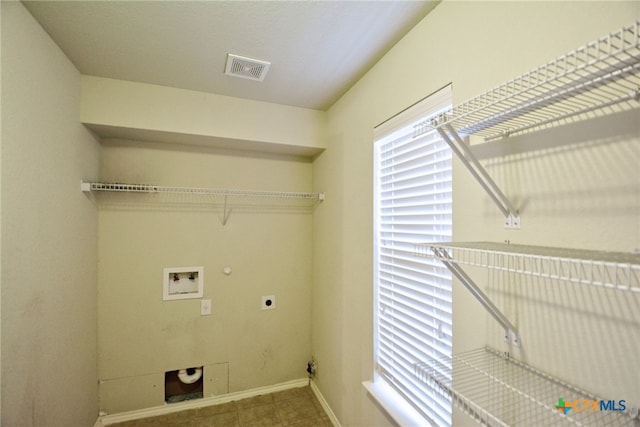 laundry area featuring gas dryer hookup, electric dryer hookup, and hookup for a washing machine