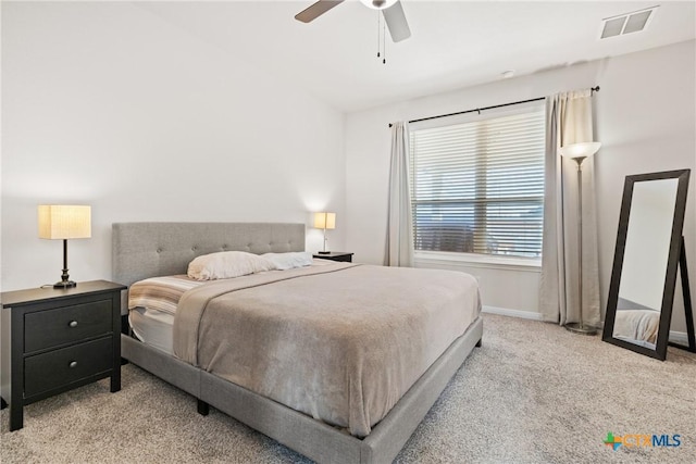 bedroom with a ceiling fan, carpet, visible vents, and baseboards