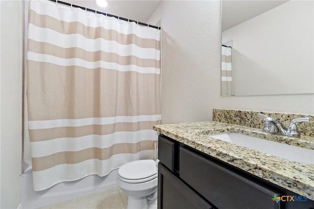 full bathroom featuring a shower with curtain, tile patterned flooring, vanity, and toilet