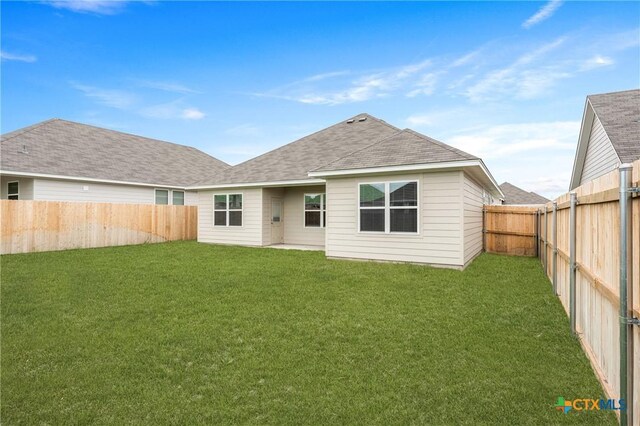 611 Killam Dr, Temple, TX 76502 - back of house featuring a lawn