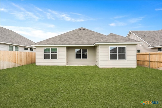 611 Killam Dr, Temple, TX 76502 - rear view of house featuring a lawn