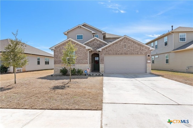 view of front of home with an attached garage, stone siding, concrete driveway, and brick siding