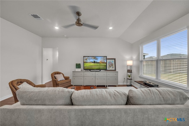 living room with vaulted ceiling and ceiling fan