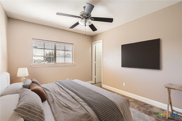 bedroom with carpet floors, baseboards, and a ceiling fan