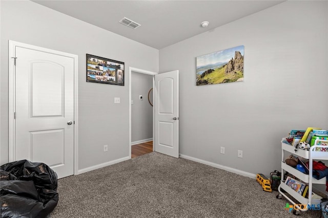 playroom featuring visible vents, baseboards, and carpet