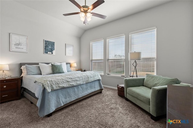 carpeted bedroom with ceiling fan, baseboards, and vaulted ceiling