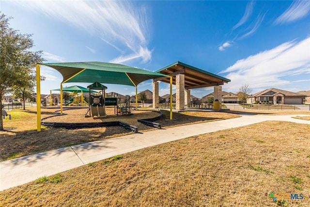 community play area with a lawn