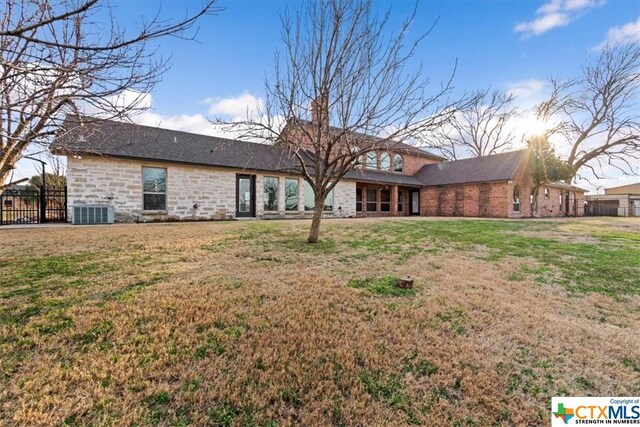 6503 Wells Fargo Rd, Killeen, TX 76542 - back of property with central AC and stone siding