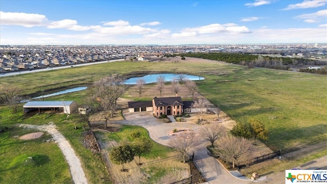 drone / aerial view featuring a water view