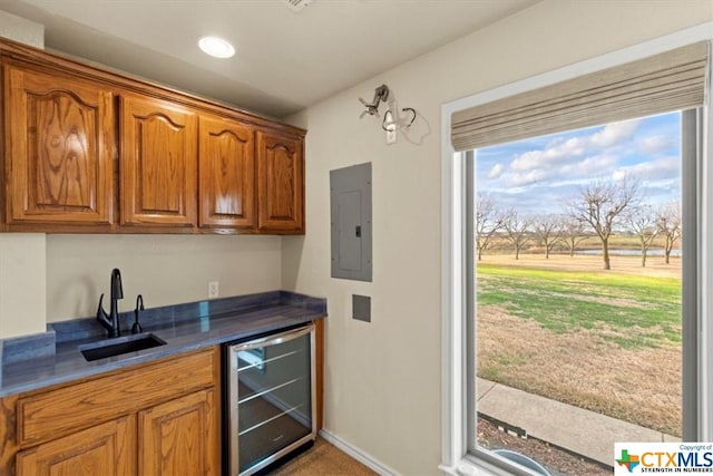 6503 Wells Fargo Rd, Killeen, TX 76542 - indoor bar with beverage cooler, electric panel, baseboards, and carpet