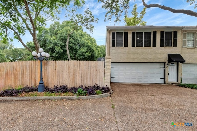 exterior space with a garage