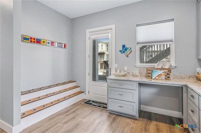 37 Flamingo Rd, Rockport, TX 78382 - bar area featuring wood finished floors and stairs