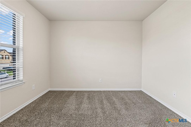 5101 Hacienda Dr, Killeen, TX 76549 - spare room featuring carpet and baseboards