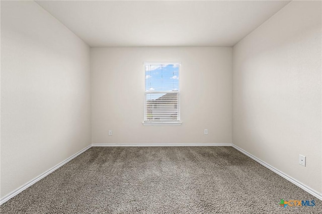 5101 Hacienda Dr, Killeen, TX 76549 - carpeted spare room featuring baseboards
