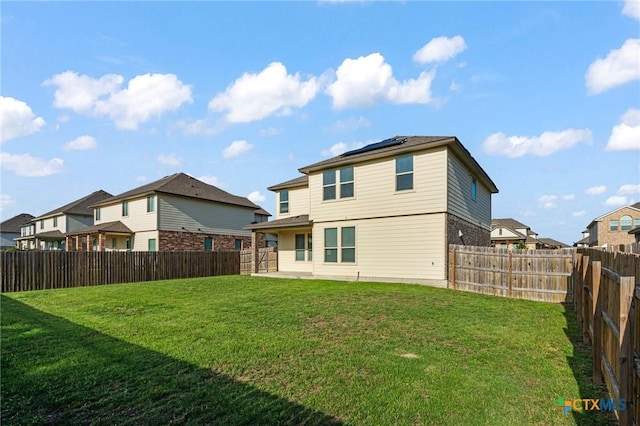 5101 Hacienda Dr, Killeen, TX 76549 - back of house featuring solar panels and a residential view