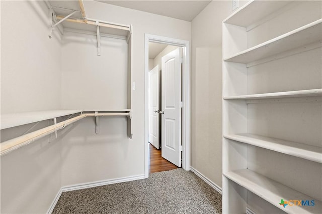 5101 Hacienda Dr, Killeen, TX 76549 - walk in closet featuring carpet flooring