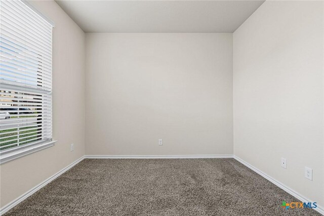 5101 Hacienda Dr, Killeen, TX 76549 - carpeted spare room featuring baseboards