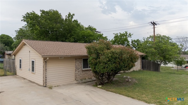 2004 Veterans Ave, Copperas Cove, TX 76522 - view of front of property featuring brick siding, roof with shingles, and concrete driveway
