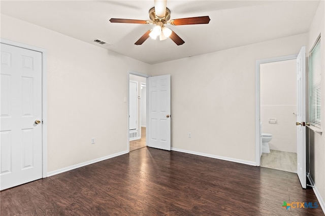 2004 Veterans Ave, Copperas Cove, TX 76522 - unfurnished bedroom with wood finished floors, connected bathroom, and baseboards
