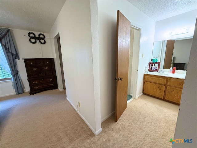 1901 Muir Dr, Killeen, TX 76543 - corridor with a textured ceiling and light carpet