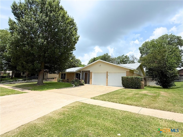 1901 Muir Dr, Killeen, TX 76543 - ranch-style home with a garage, brick siding, and driveway