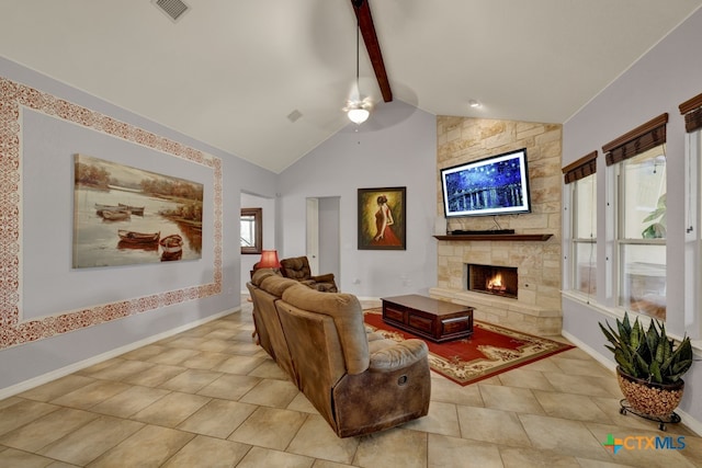 living room with beam ceiling, high vaulted ceiling, a stone fireplace, and light tile patterned flooring