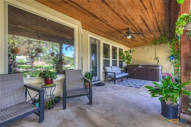 view of patio / terrace featuring ceiling fan