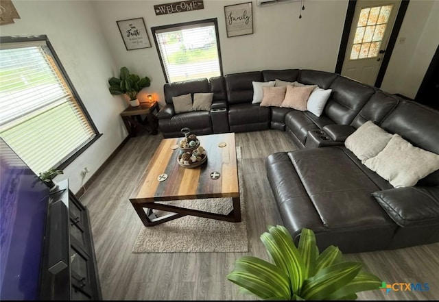 202 Clark St, Yoakum, TX 77995 - living area featuring wood finished floors