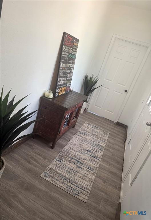 202 Clark St, Yoakum, TX 77995 - entryway featuring wood finished floors