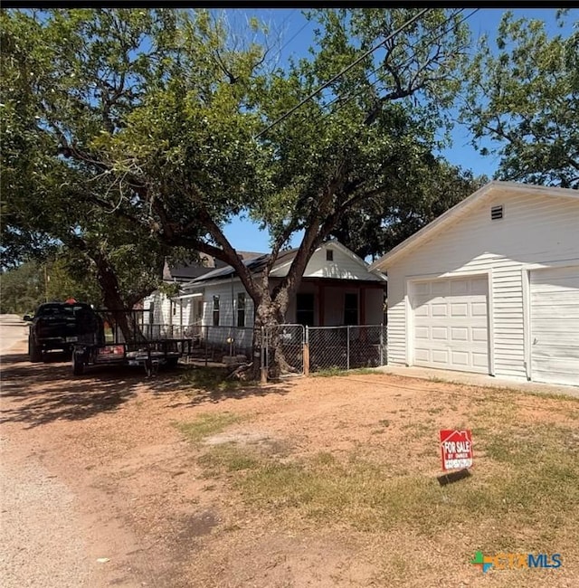 202 Clark St, Yoakum, TX 77995 - view of front of house with an outdoor structure