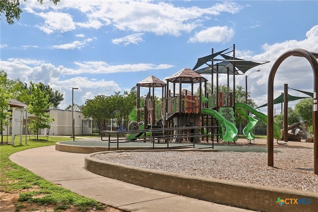 community jungle gym with fence