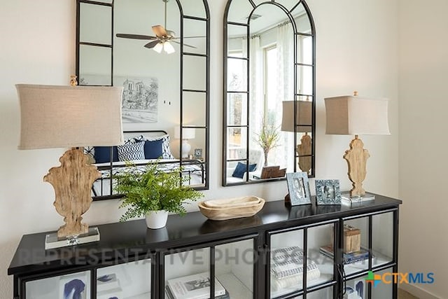 interior space with a ceiling fan