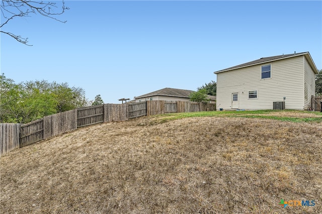 view of yard with central AC