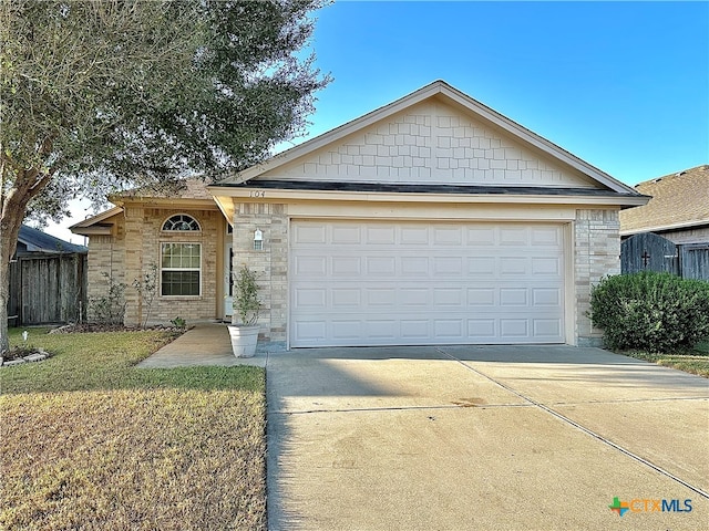 ranch-style home with a garage