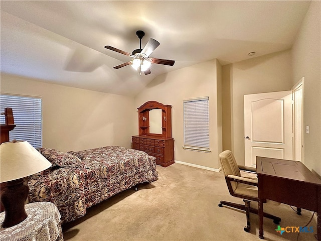 carpeted bedroom with lofted ceiling and ceiling fan