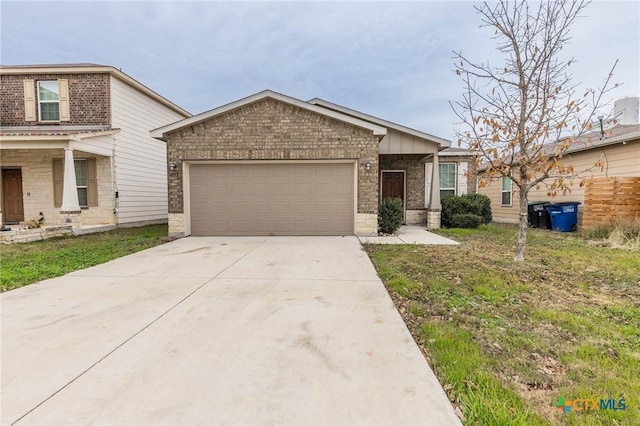 view of front of property with a garage and a front lawn