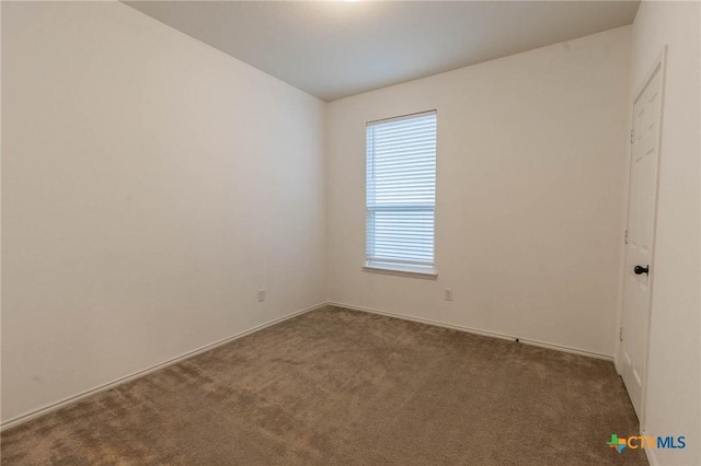 view of carpeted spare room