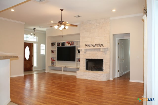 unfurnished bedroom featuring light colored carpet, vaulted ceiling, and ceiling fan