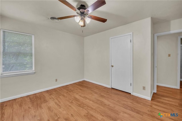 1210 Ridgemont Dr, Killeen, TX 76549 - unfurnished room featuring a ceiling fan, wood finished floors, and baseboards