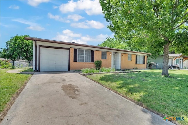 1210 Ridgemont Dr, Killeen, TX 76549 - single story home featuring a garage, brick siding, and concrete driveway
