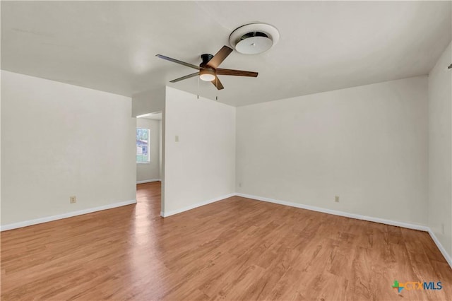 1210 Ridgemont Dr, Killeen, TX 76549 - empty room with a ceiling fan, light wood finished floors, and baseboards