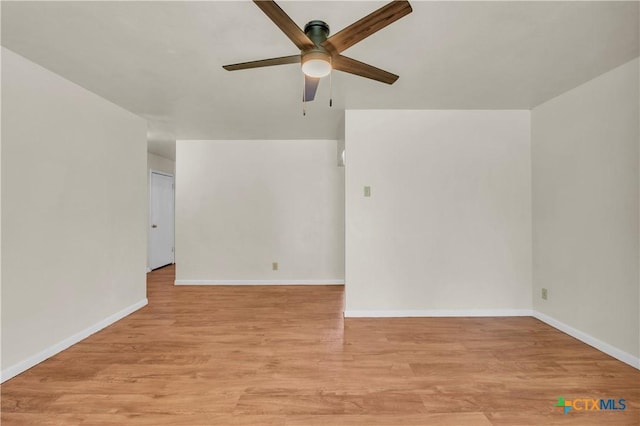 1210 Ridgemont Dr, Killeen, TX 76549 - empty room with a ceiling fan, light wood-style flooring, and baseboards