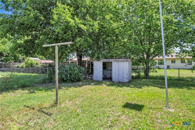 1210 Ridgemont Dr, Killeen, TX 76549 - view of yard featuring a storage unit and an outbuilding