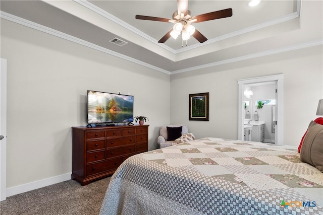 117 Aidan Ct, Burnet, TX 78611 - bedroom with a tray ceiling, carpet flooring, ornamental molding, baseboards, and ceiling fan