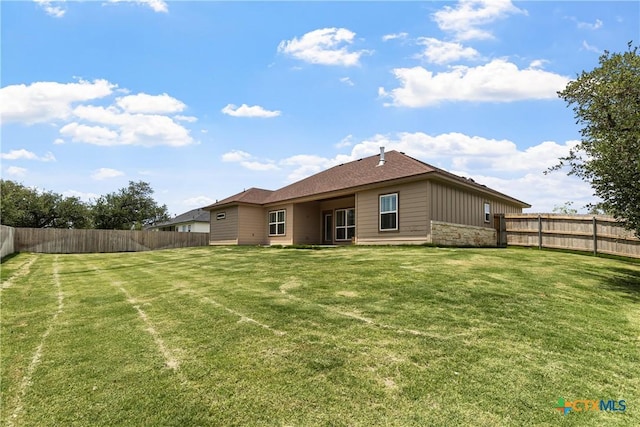 117 Aidan Ct, Burnet, TX 78611 - back of house featuring stone siding