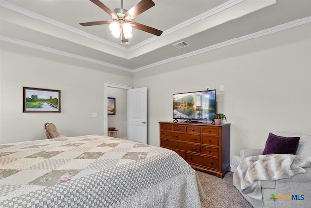 117 Aidan Ct, Burnet, TX 78611 - bedroom featuring carpet, a raised ceiling, crown molding, and a ceiling fan