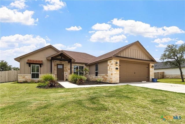 117 Aidan Ct, Burnet, TX 78611 - view of front facade with board and batten siding, stone siding, driveway, an attached garage, and roof with shingles