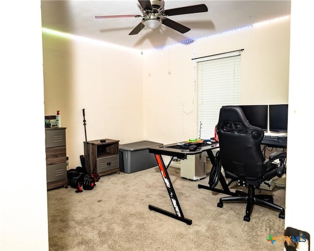 office area with light colored carpet and ceiling fan