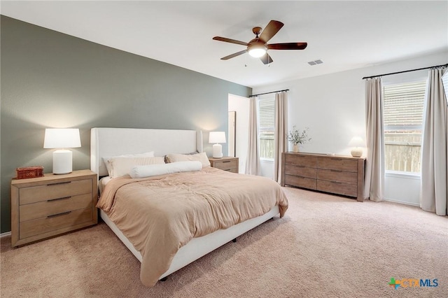 4648 Padula Dr, Round Rock, TX 78665 - bedroom featuring light colored carpet and ceiling fan