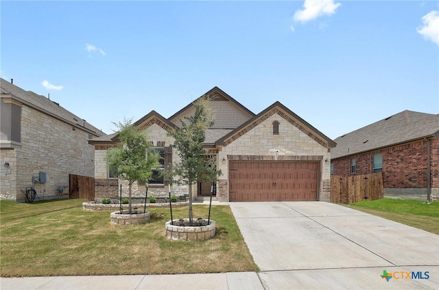 4648 Padula Dr, Round Rock, TX 78665 - french country style house with a garage, driveway, and stone siding